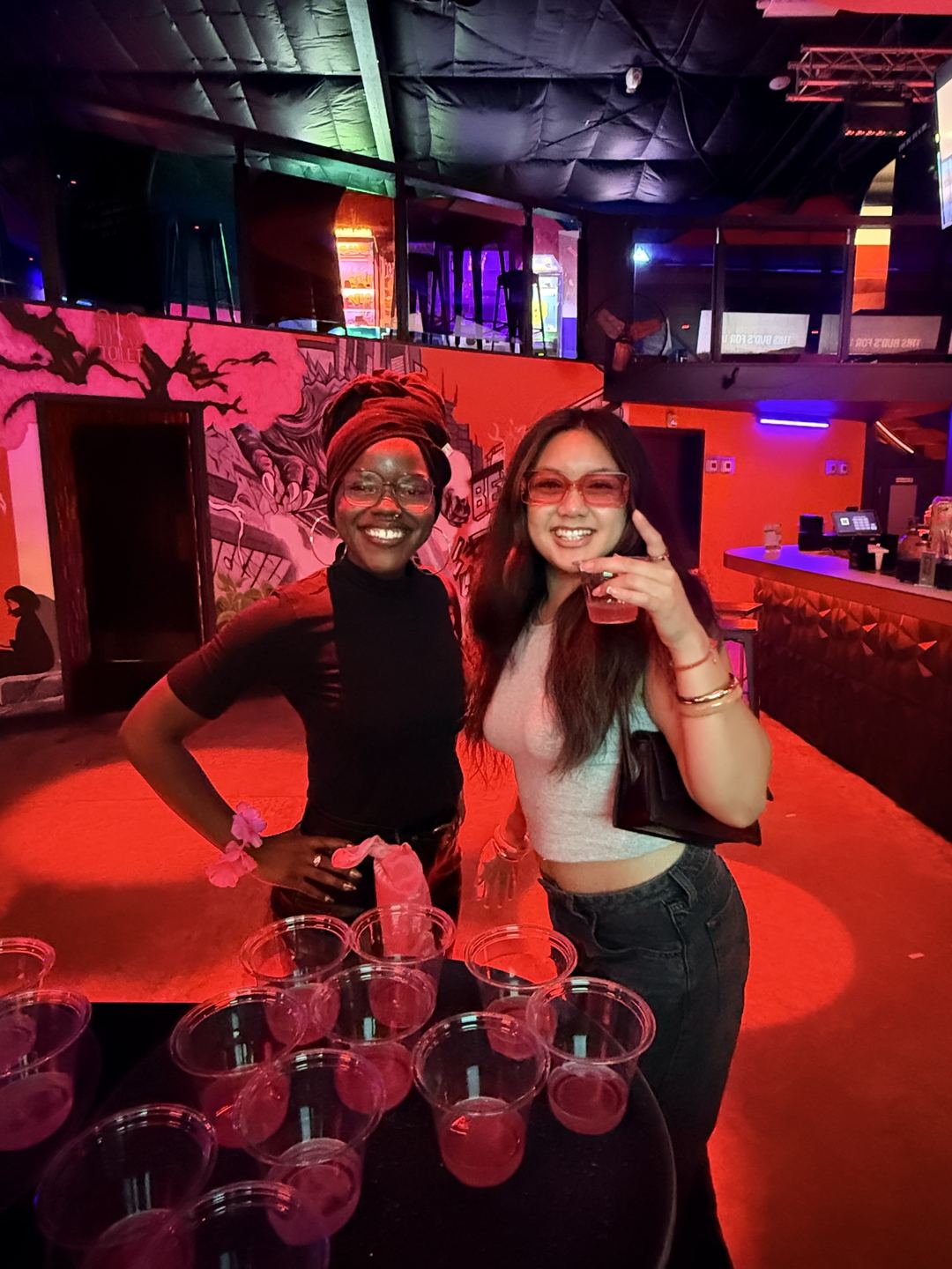 Events — Nightclub activation with brand ambassador and attendee enjoying signature cocktails
